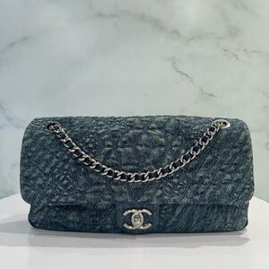 CHANEL Quilted Denim Flap Bag in Washed Blue Denim with Silver Hardware